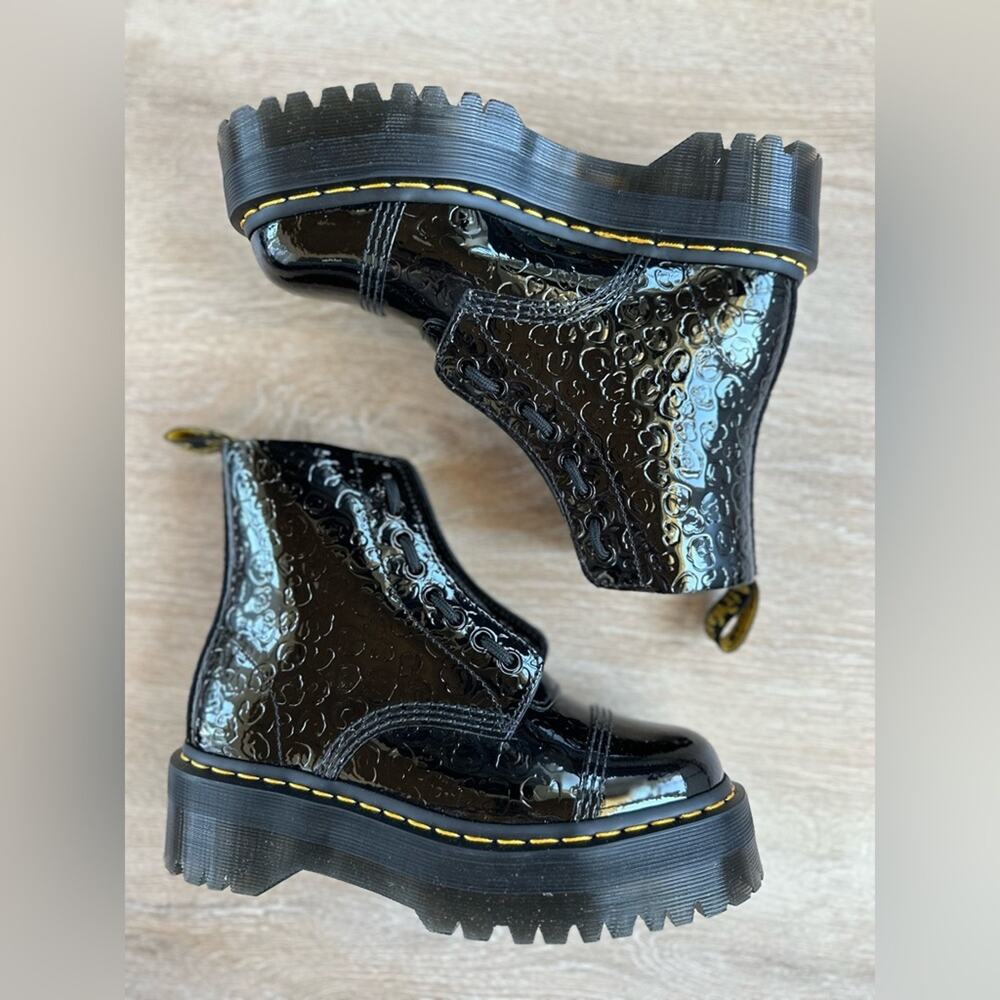 Dr. Martens Glossy Black Embossed Ankle Boots - Picture 2 of 14